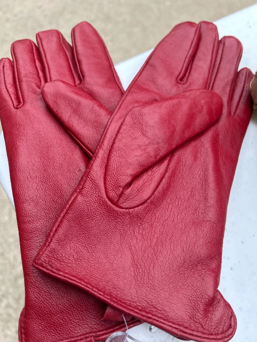 Red leather gloves